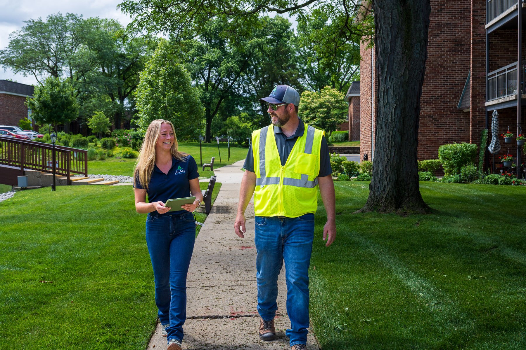 account manager and crew walking property