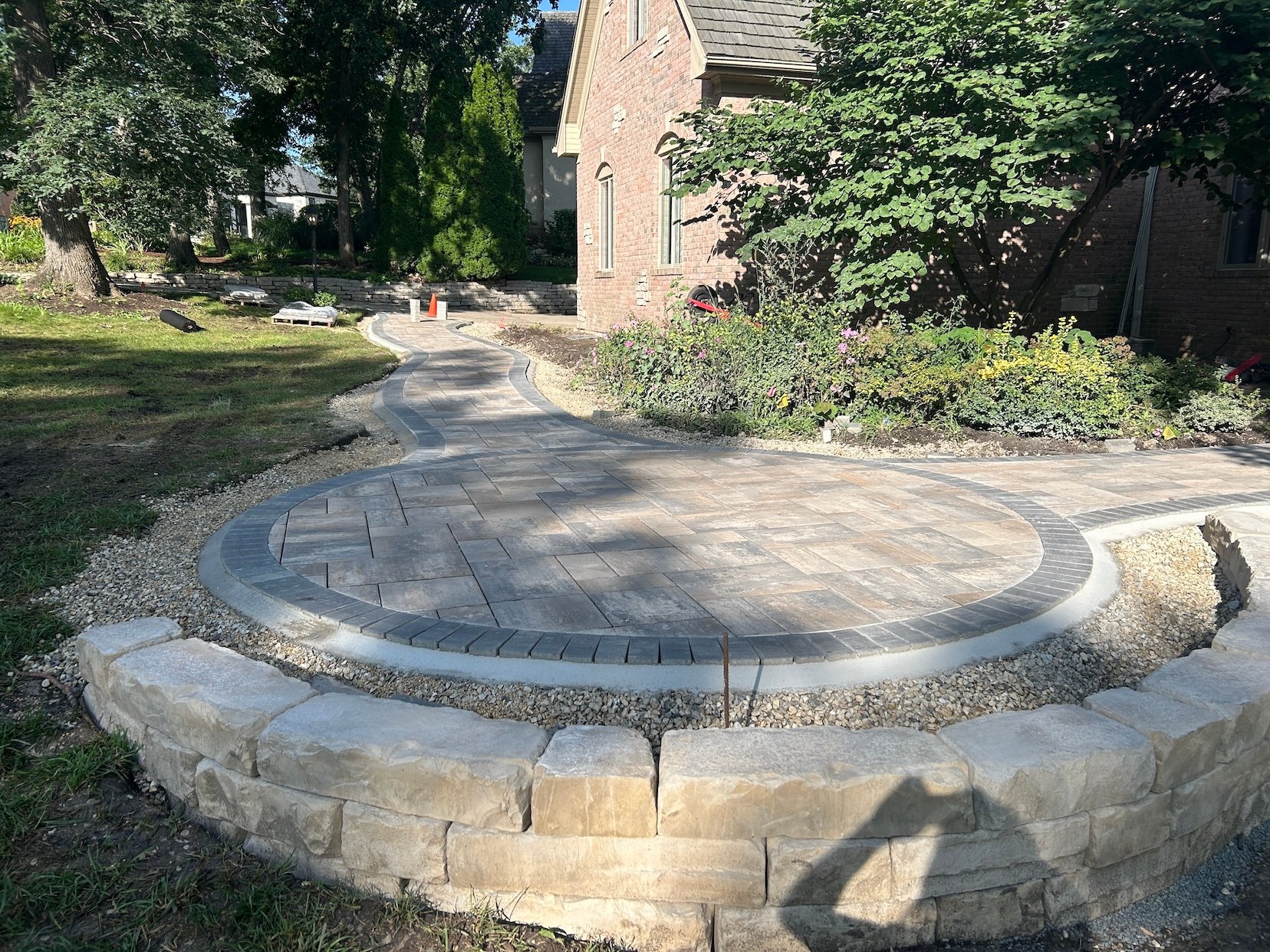 Fisher Burton sidewalk installation front of house pavers